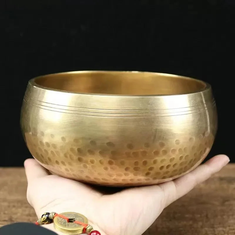 Authentic handmade Tibetan brass singing bowl from Nepal, including leather mallet.