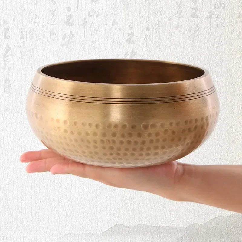 Authentic handmade Tibetan brass singing bowl from Nepal, including leather mallet.