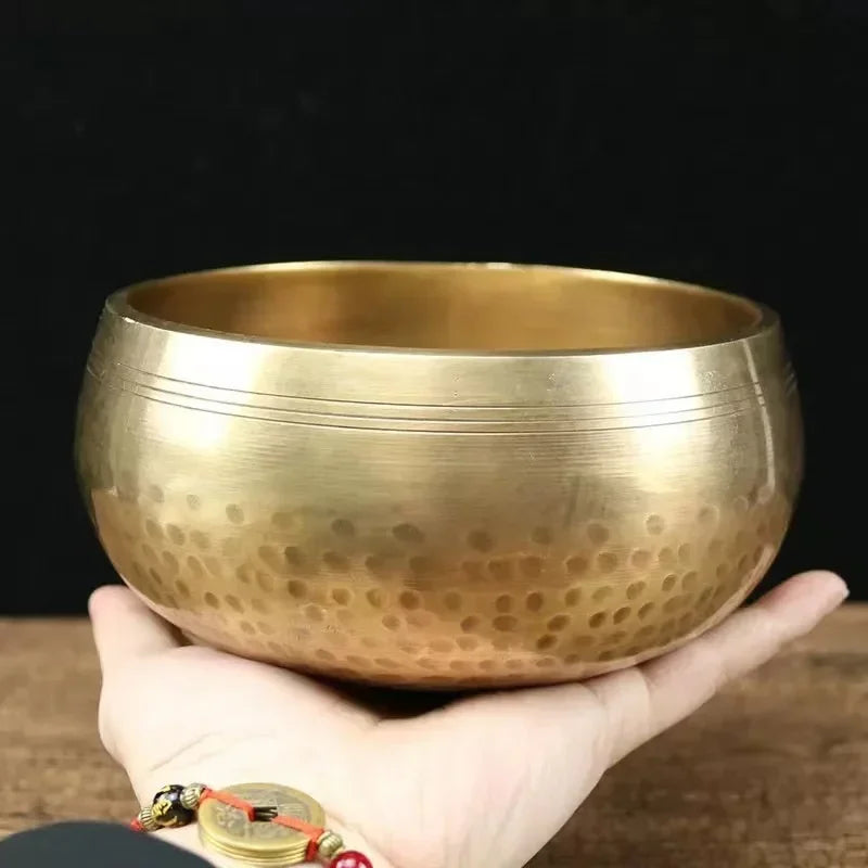 Authentic handmade Tibetan brass singing bowl from Nepal, including leather mallet.