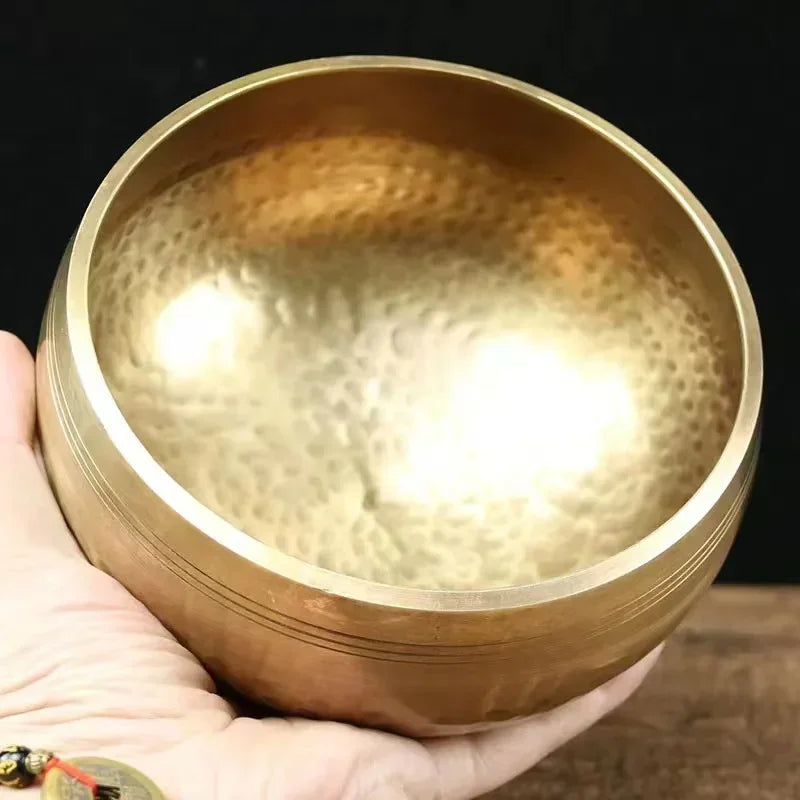 Authentic handmade Tibetan brass singing bowl from Nepal, including leather mallet.