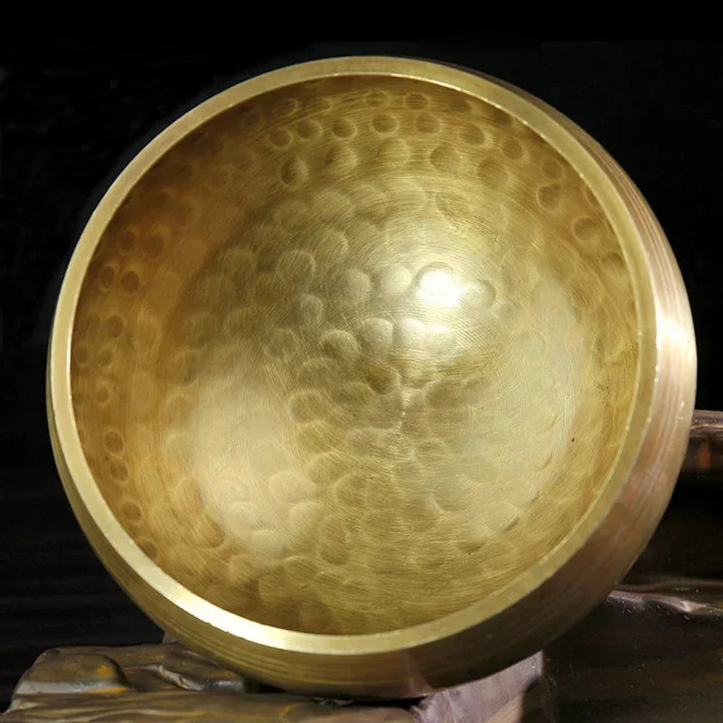 Authentic handmade Tibetan brass singing bowl from Nepal, including leather mallet.