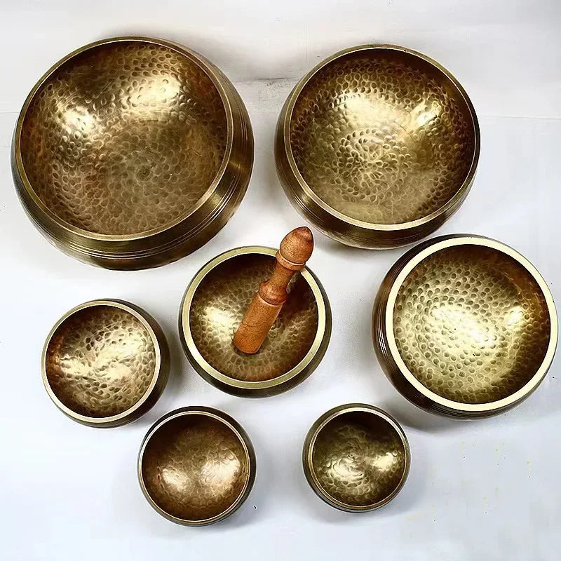 Authentic handmade Tibetan brass singing bowl from Nepal, including leather mallet.