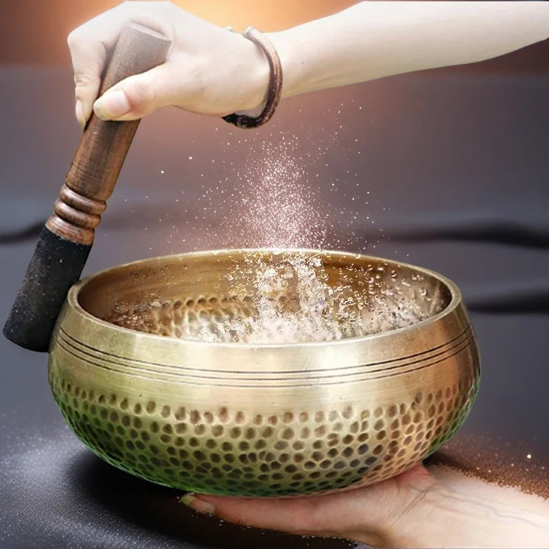 Authentic handmade Tibetan brass singing bowl from Nepal, including leather mallet.
